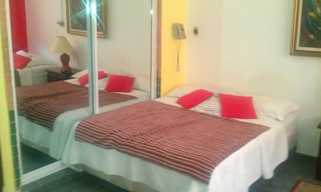 Hotel Navarro Santo Domingo Quarto foto